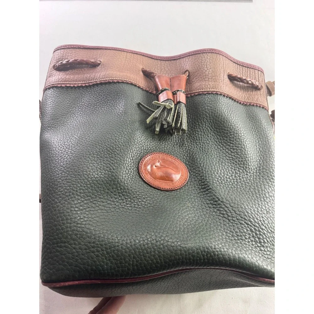 Dooney & Bourke Vintage All Weather Leather Drawstring Bucket Bag Green Tan - Picture 1 of 8